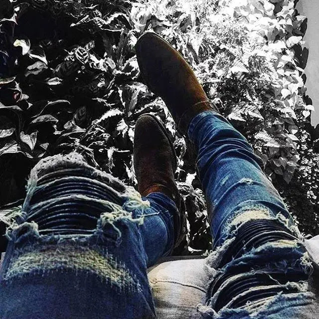 Jeans für Männer High Street mit Löchern und schwarzen Spitzen Slim Fit Jeans und Herren hosen